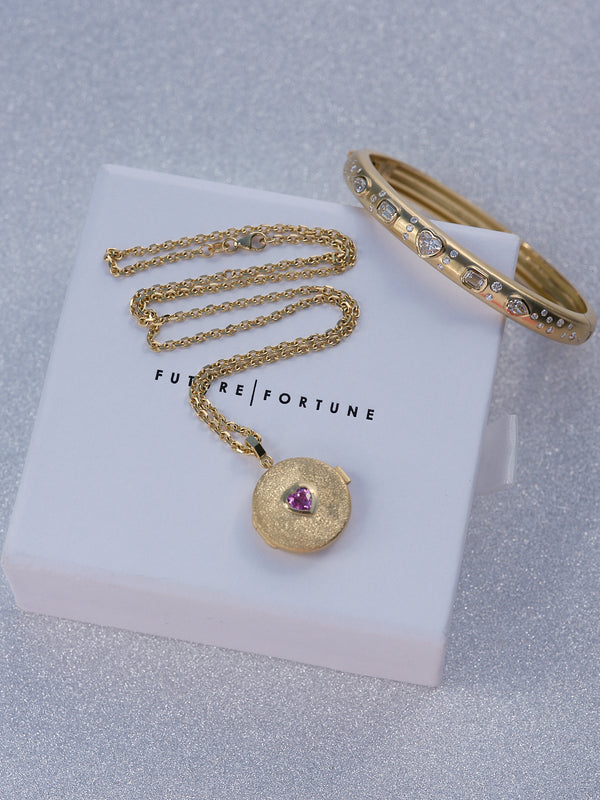 Necklace and bangle bracelet on gift box
