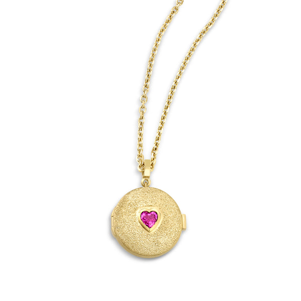 18k yellow gold necklace with locket that has a bezel set heart shaped Pink Sapphire