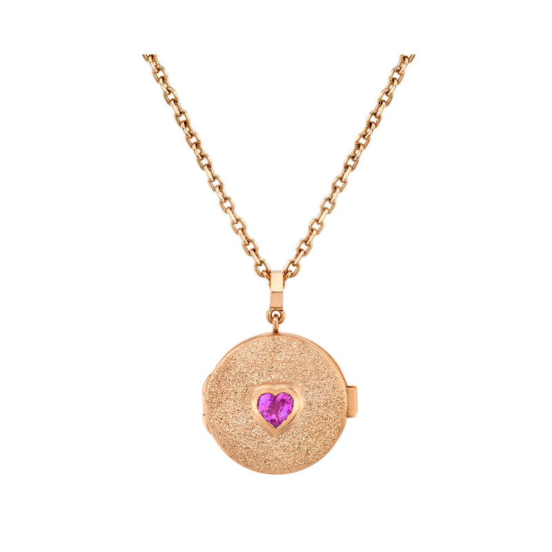 18k rose gold necklace with locket that has a bezel set heart shaped Pink Sapphire