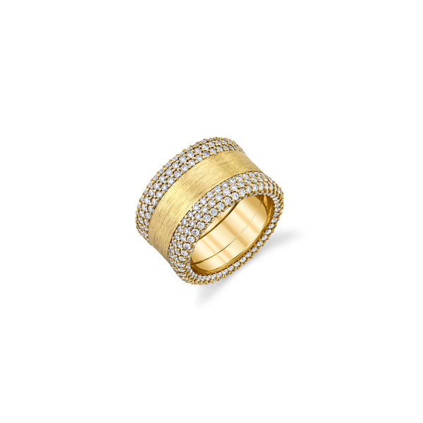 18k yellow gold band ring with pavé set white diamonds around the outsides of the band with solid gold in the center of the band