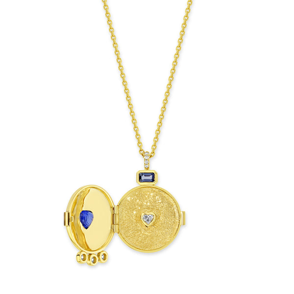 18k yellow gold locket necklace inside view of the locket shows a bezel set heart shaped white diamond.