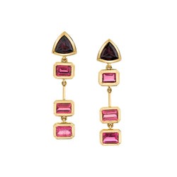 18k yellow gold drop earring with 3 bezel set hot pink tourmaline and 1 rhodonite. The top stone is a trillion shaped rhodonite and there are 3 emerald cut tourmaline stones that drop from the rhodonite 